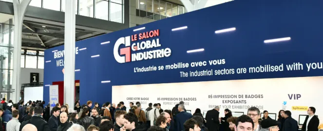Entrance of Global Industrie trade fair with visitors at registration area