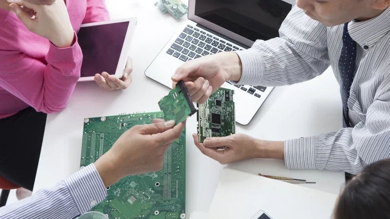 Engineers comparing ODM vs OEM options for industrial PC design and production