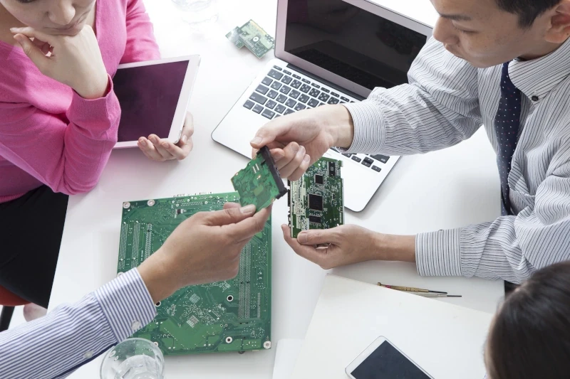 Engineers comparing ODM vs OEM options for industrial PC design and production