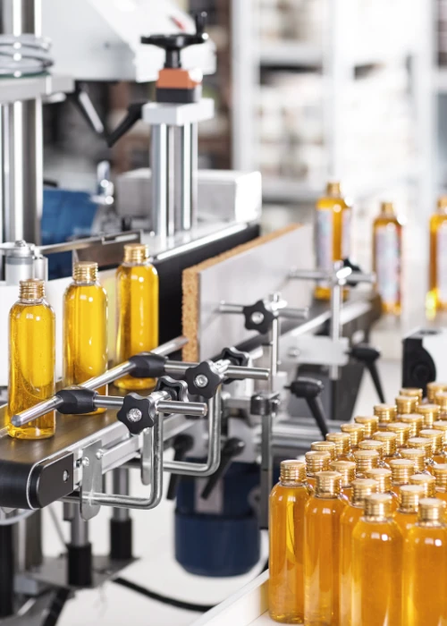 Automated bottling line with industrial control systems and precision filling equipment